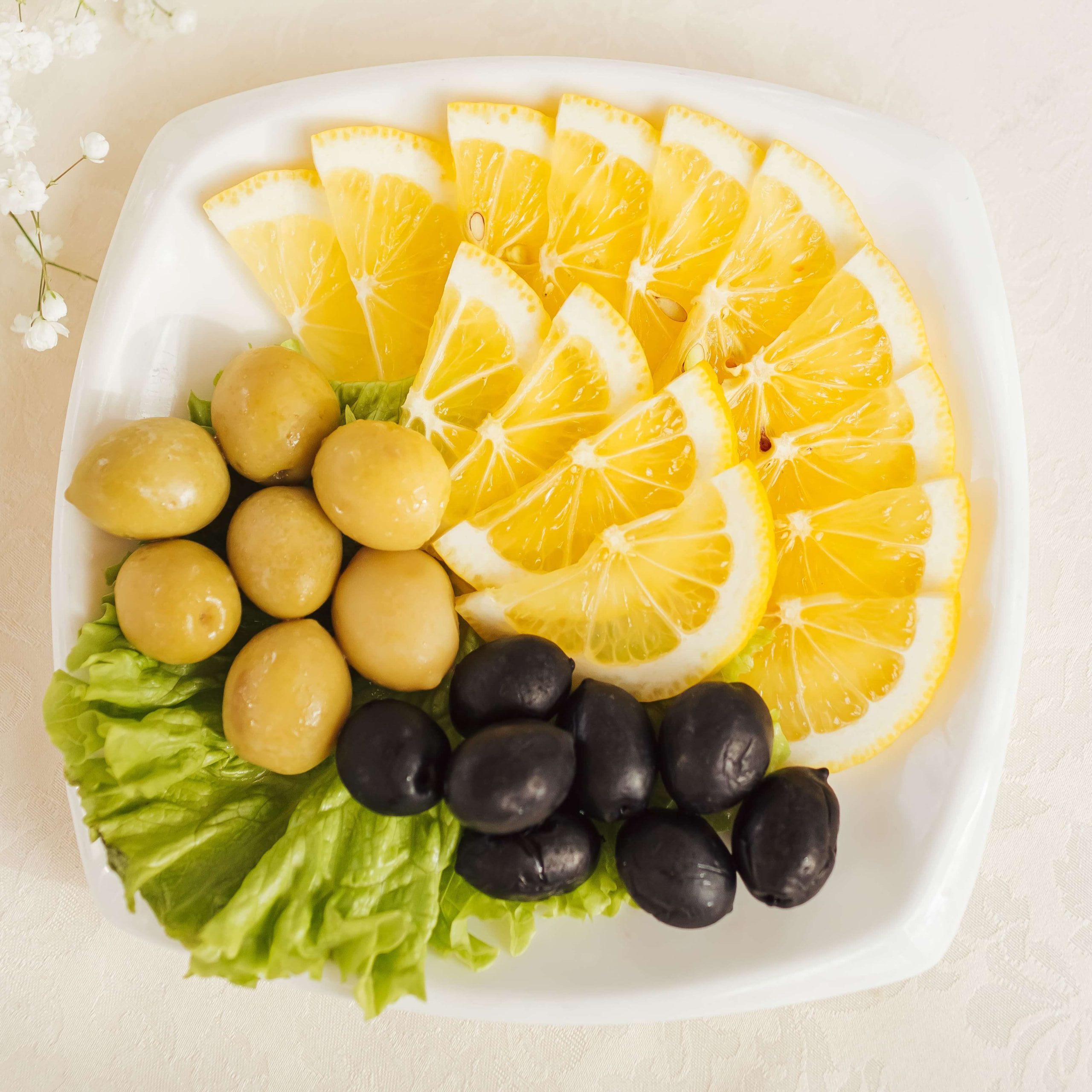 Оливки маслины лимон